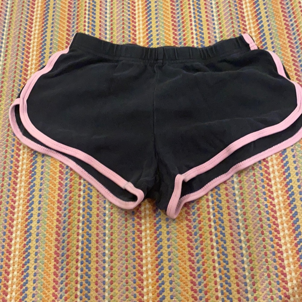 black shorts with pink outline